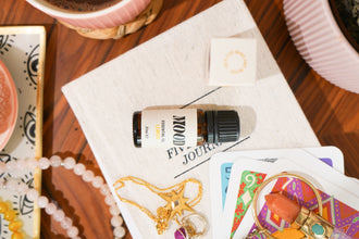 A woman blending essential oils